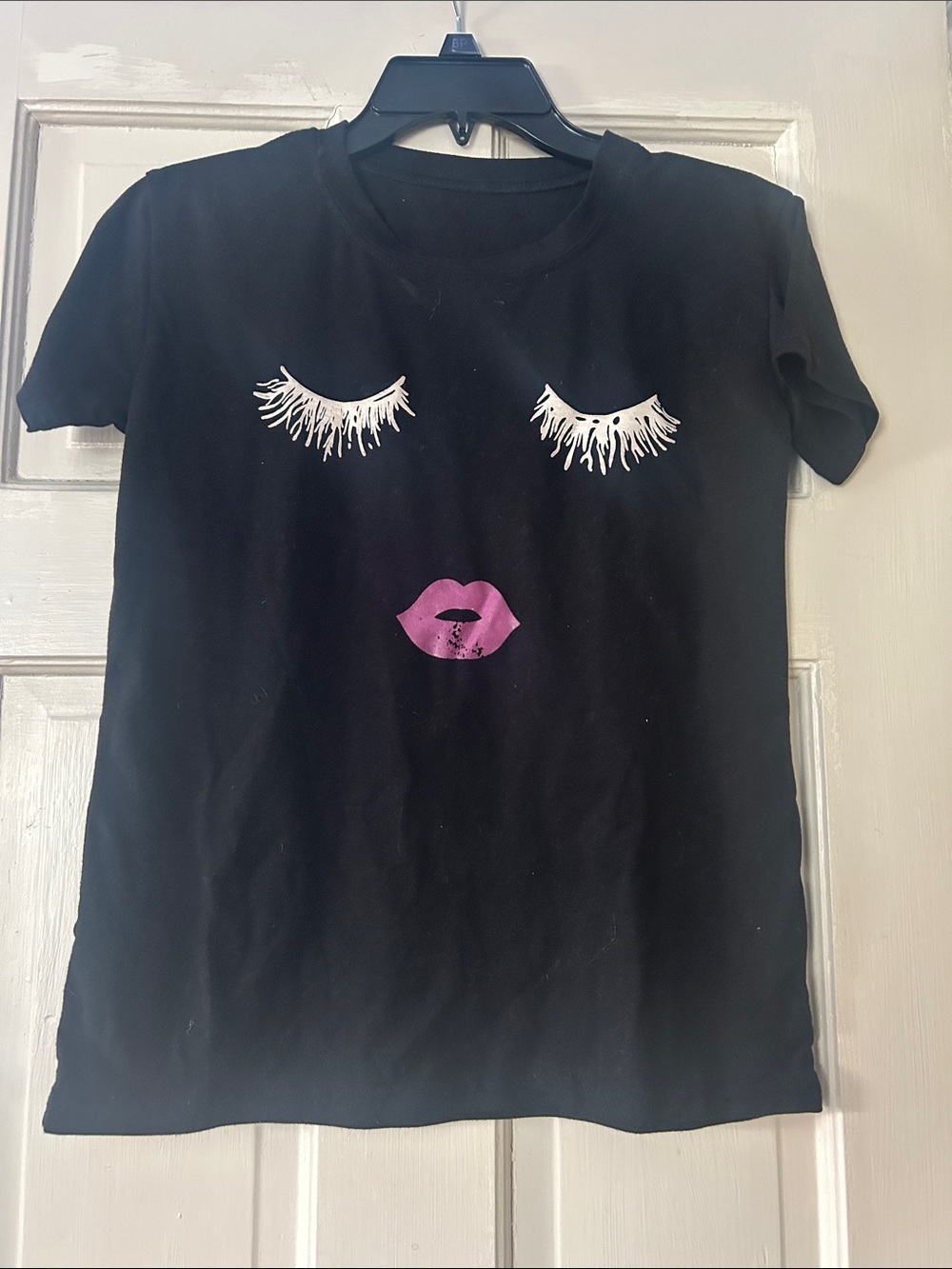 Black Graphic Tee with White Lashes and Pink Lips